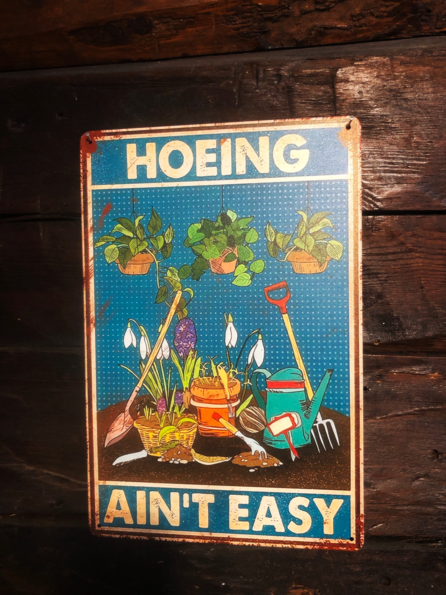 Plåtskylt - Hoeing ain't easy